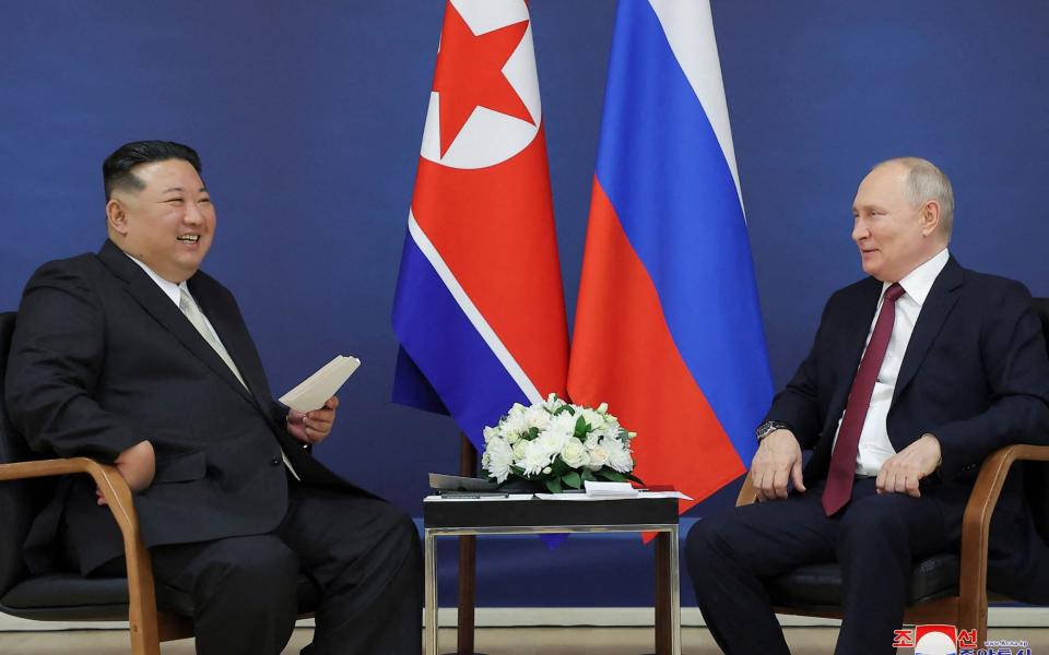 Kim Jong-un meets with Vladimir Putin at the Vostochny Cosmodrome in Russia's Amur region on September 13, 2023
