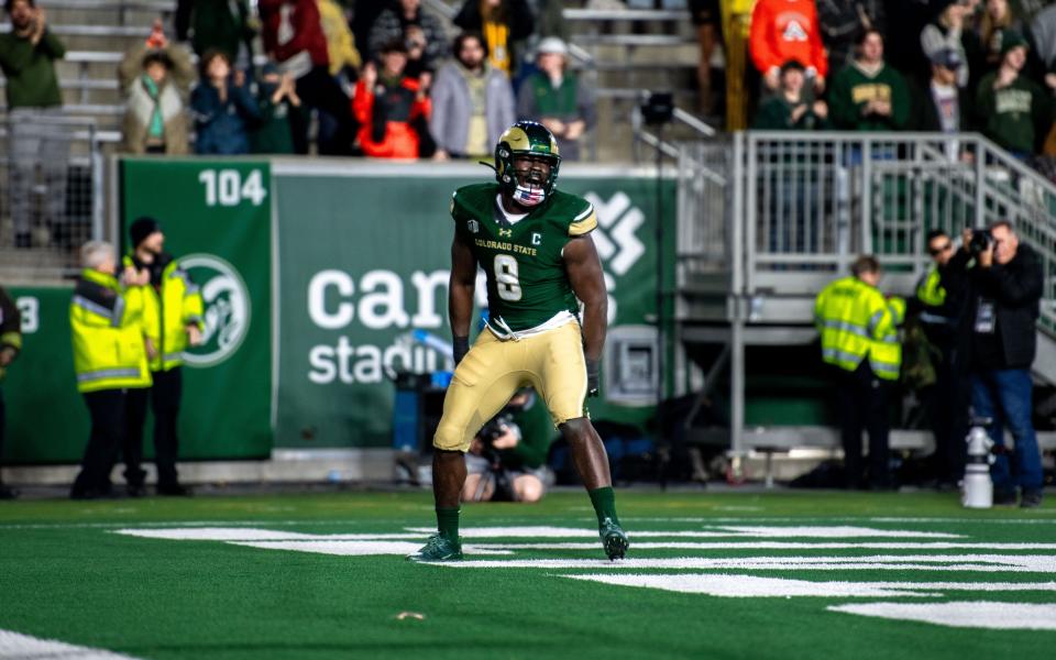 CSU football's senior defensive lineman Mohamed Kamara (8) celebrates his sack for a safety against San Diego State at Canvas Stadium on Saturday, Nov. 11, 2023.