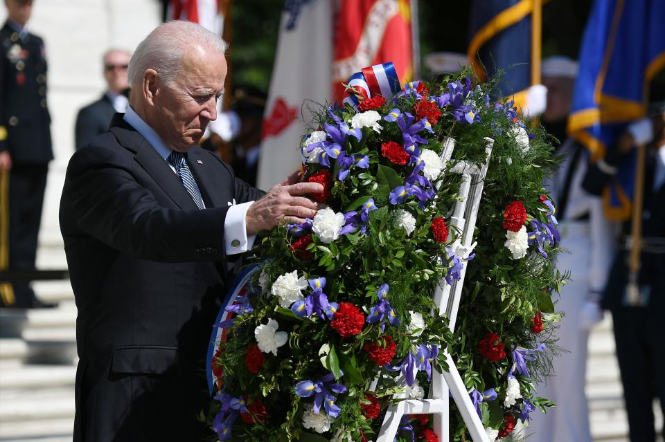 President Joe Biden takes part in a wreath-laying in front of Tomb of the Unknown Soldier at Arlington National Cemetery on Memorial Day. (Photo: MANDEL NGAN via Getty Images)