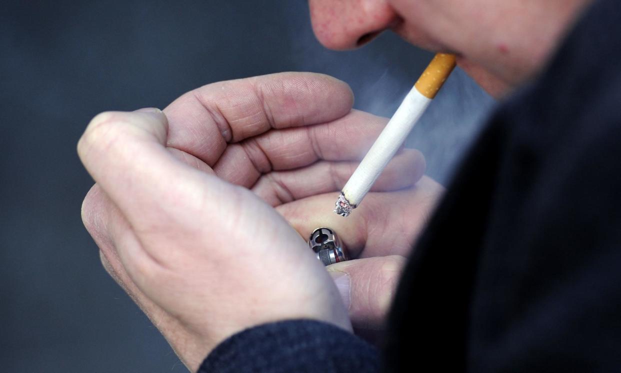 <span>A man smoking a cigarette.</span><span>Photograph: Jonathan Brady/PA</span>