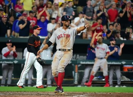 Aug 10, 2018; Baltimore, MD, USA; Boston Red Sox shortstop Xander Bogaerts (2) reacts after scoring a run in the sixth inning against the Baltimore Orioles at Oriole Park at Camden Yards. Mandatory Credit: Evan Habeeb-USA TODAY Sports