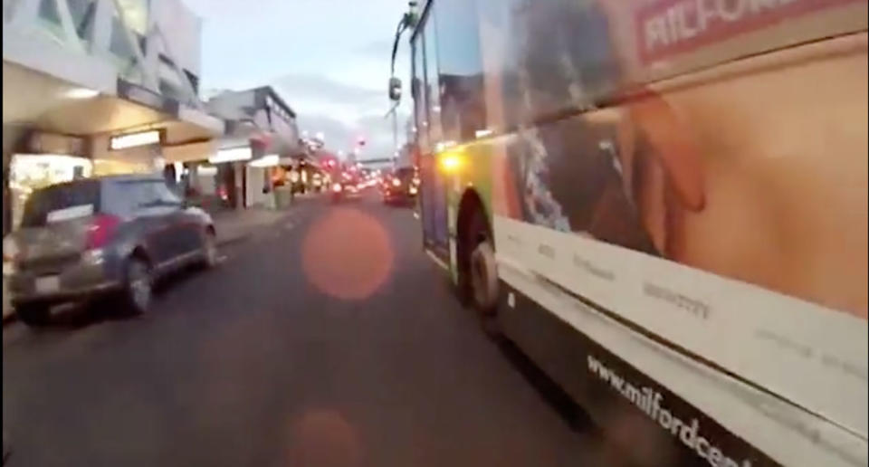 Vision taken from Mr Tang’s helmet camera, shows the bus moving into the cyclist’s lane . Photo: Twitter/ Alec Tang