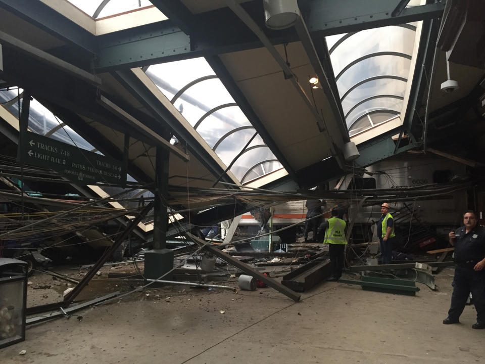 <p>A NJ Transit train seen through the wreckage after it crashed in to the platform at the Hoboken Terminal September 29, 2016 in Hoboken, New Jersey. (Pancho Bernasconi/Getty Images) </p>