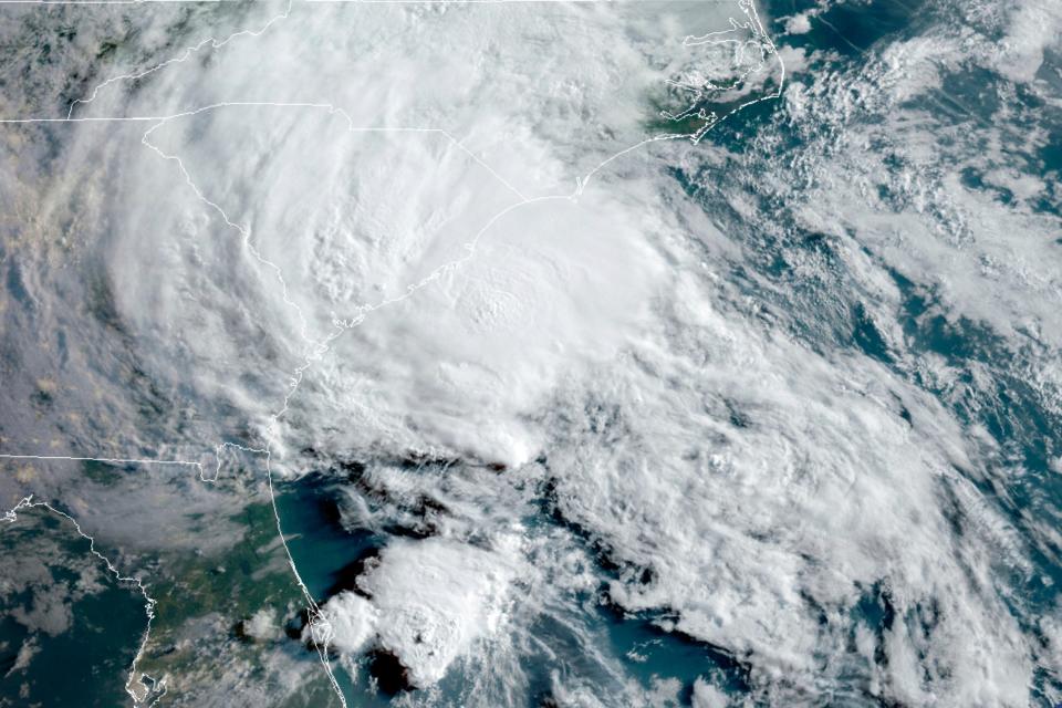 <p>This Wednesday, 27 May 2020 satellite image made available by the National Oceanic and Atmospheric Administration shows Tropical Storm Bertha approaching the South Carolina coast</p> ((Associated Press))