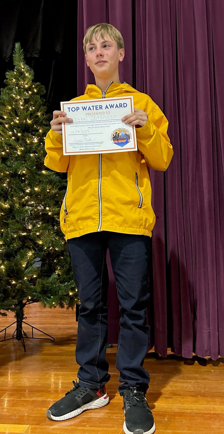 Seventh grader Logan Cataneso, shown here, took home the first place Top Water Award with his project titled, “Homemade Water Filtration System" while sixth grader Natalie Mendoza won the second place award with her project called “Safe Water.”