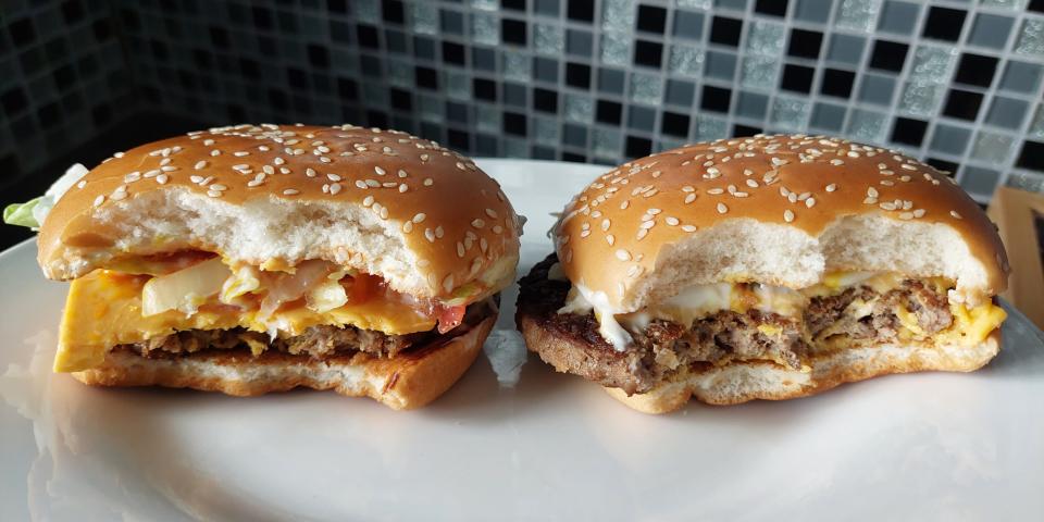 Photo of a McPlant Quarter Pounder with Cheese from McDonald's, displayed on a plate. Both have been bitten into. Taken in July 2024