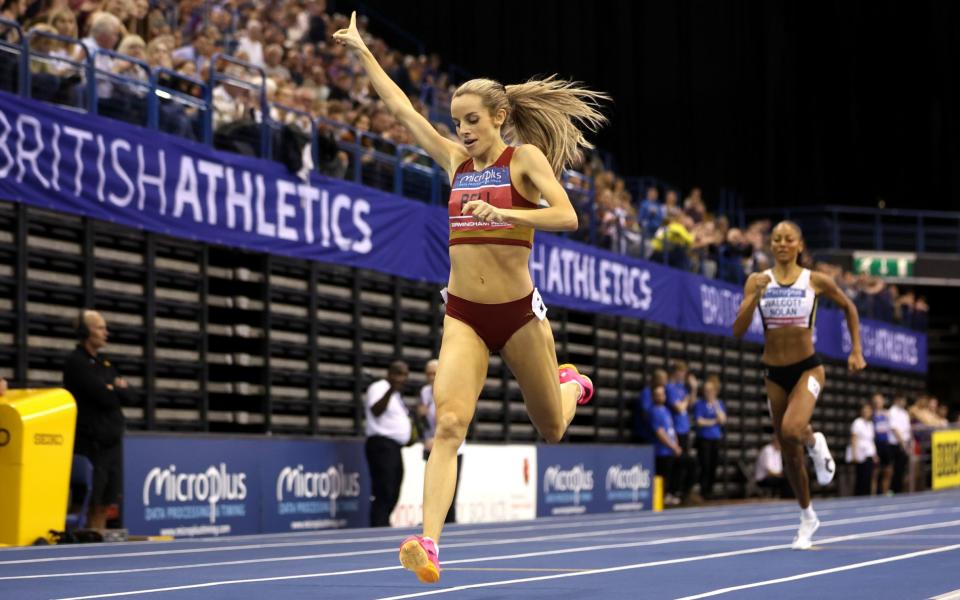Gold medallist Georgia Bell of Great Britain crosses the line in the Women's 1500m Final during day two of the 2024 Microplus UK Athletics Indoor Championships in Birmingham on February 18, 2024