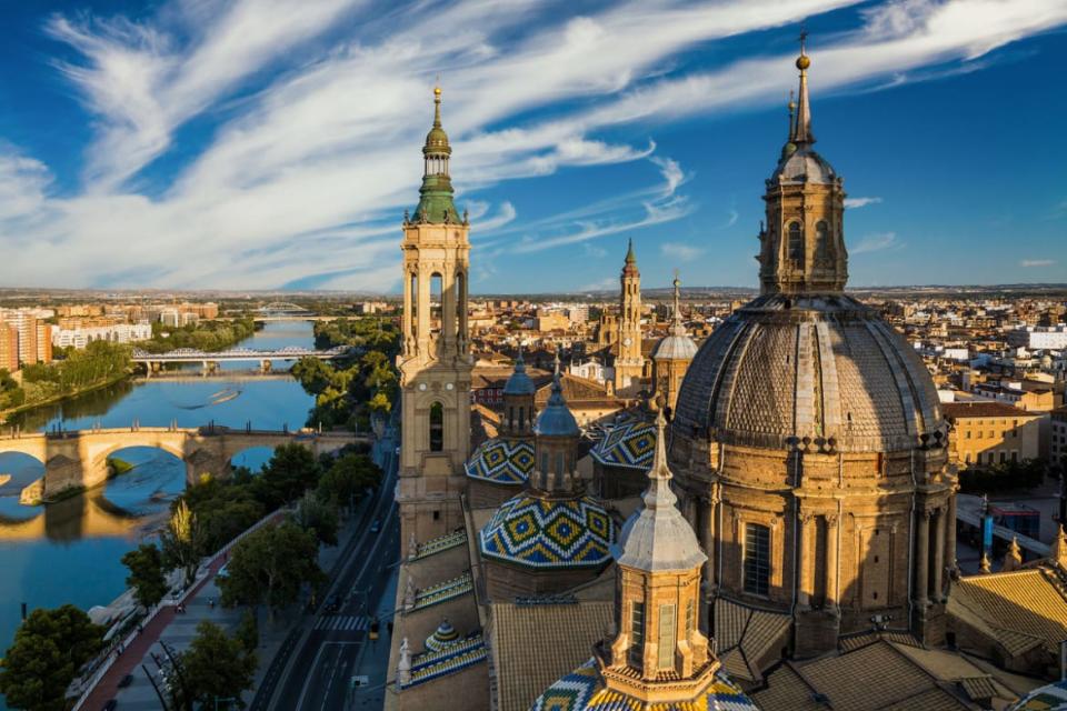 <div class="inline-image__caption"><p>View of the roofs and spires of basilica of Our Lady in Zaragoza, Spain.</p></div> <div class="inline-image__credit">Anton Petrus/Getty Images</div>