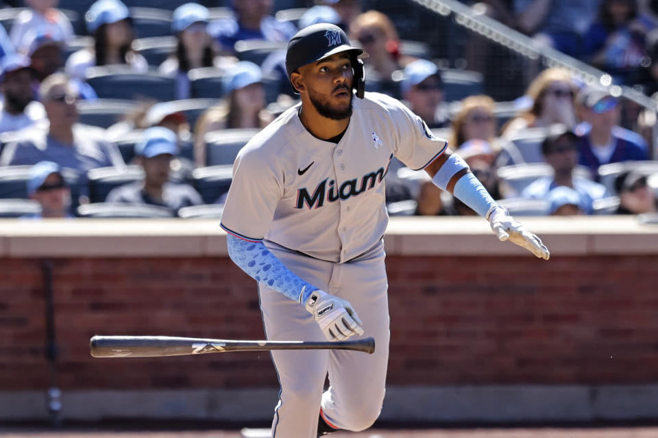 Miami Marlins' Jerar Encarnacion drops his bat after hitting a grand slam against New York Mets relief pitcher Seth Lugo during the seventh inning of a baseball game, Sunday, June 19, 2022, in New York. (AP Photo/Jessie Alcheh)