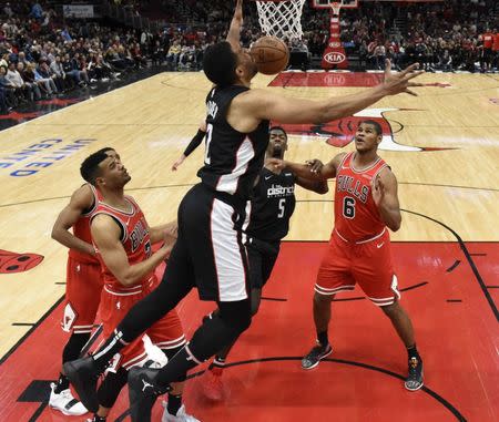 Feb 9, 2019; Chicago, IL, USA; Washington Wizards forward Jabari Parker (12) tries to grab a rebound against the Chicago Bulls during the second half at United Center. Mandatory Credit: David Banks-USA TODAY Sports