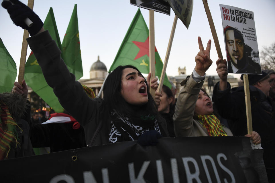 Supporters of the Kurdish people take part in a demonstration against the NATO summit and U.S. President Donald Trump's visit, in London, Tuesday, Dec. 3, 2019. Trump and his NATO counterparts were gathering in London Tuesday to mark the alliance's 70th birthday amid deep tensions as spats between leaders expose a lack of unity that risks undermining military organization's credibility. (AP Photo/Alberto Pezzali)