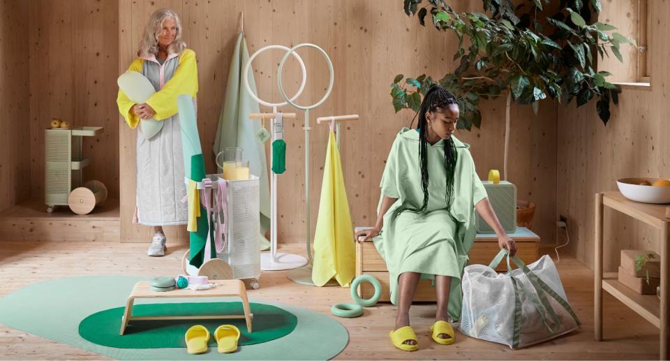 Two women in a home gym with exercise equipment and accessories from IKEA 