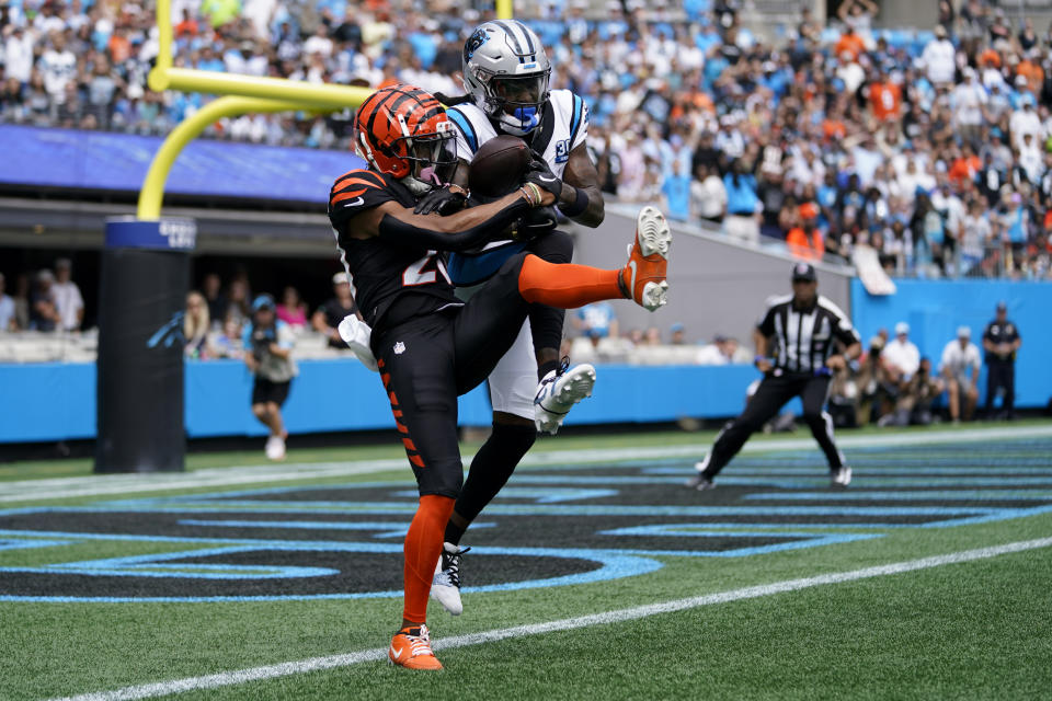 Cincinnati Bengals cornerback DJ Turner II breaks up a pass intended for Carolina Panthers wide receiver Diontae Johnson during the first half of an NFL football game, Sunday, Sept. 29, 2024, in Charlotte, N.C. (AP Photo/Erik Verduzco)