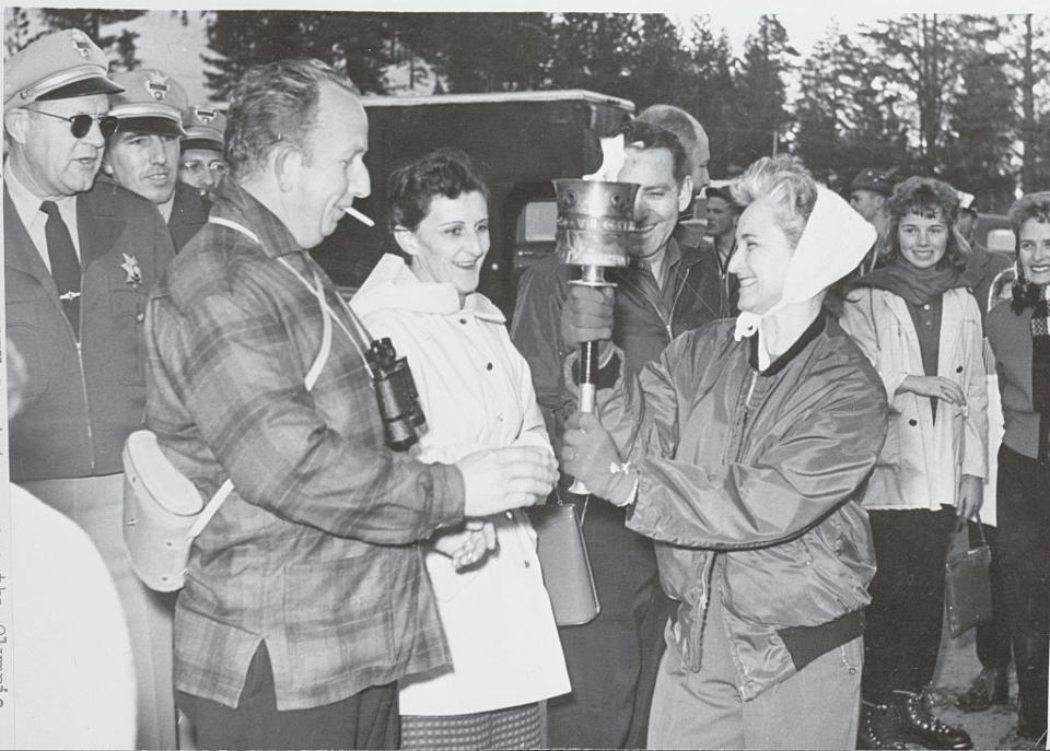 <p>Spectators got the chance to participate in an Olympic tradition as the torch was passed through the crowd at the Winter Olympic Games at Squaw Valley in 1960. The ceremony was also notable as it was produced by Walt Disney, who was the chair of the pageantry committee. </p>