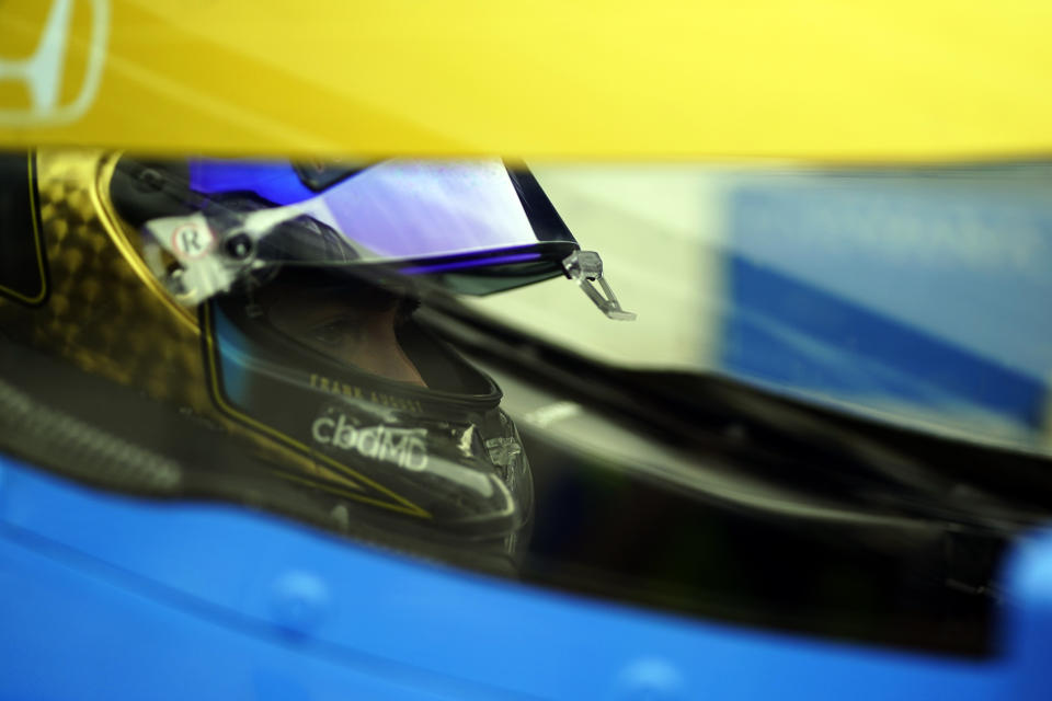 Jimmie Johnson sits in his car during qualifications for the Indianapolis 500 auto race at Indianapolis Motor Speedway, Saturday, May 21, 2022, in Indianapolis. (AP Photo/Darron Cummings)