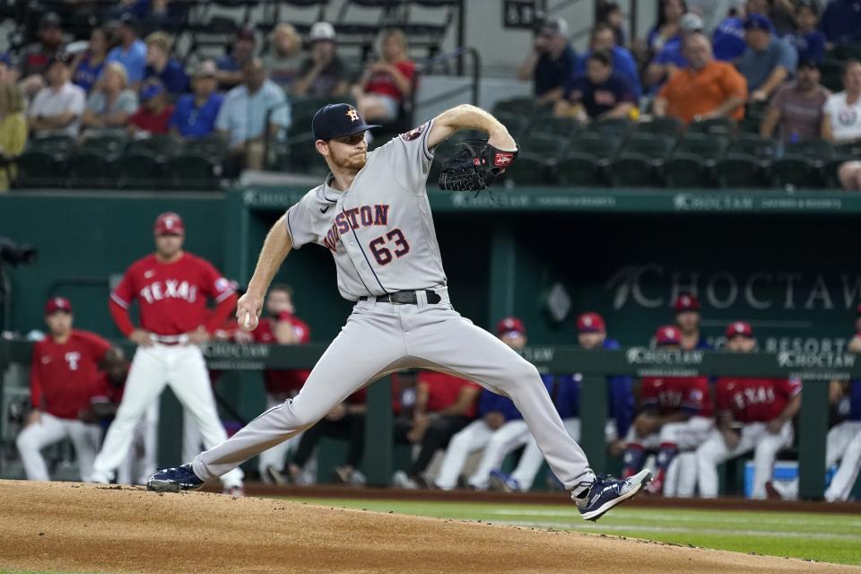 Houston Astros starting pitcher Tyler Ivey (63) throw to a Texas Rangers batter during the first inning of a baseball game in Arlington, Texas, Friday, May 21, 2021. Ivey made his major league debut in the game. (AP Photo/Tony Gutierrez)