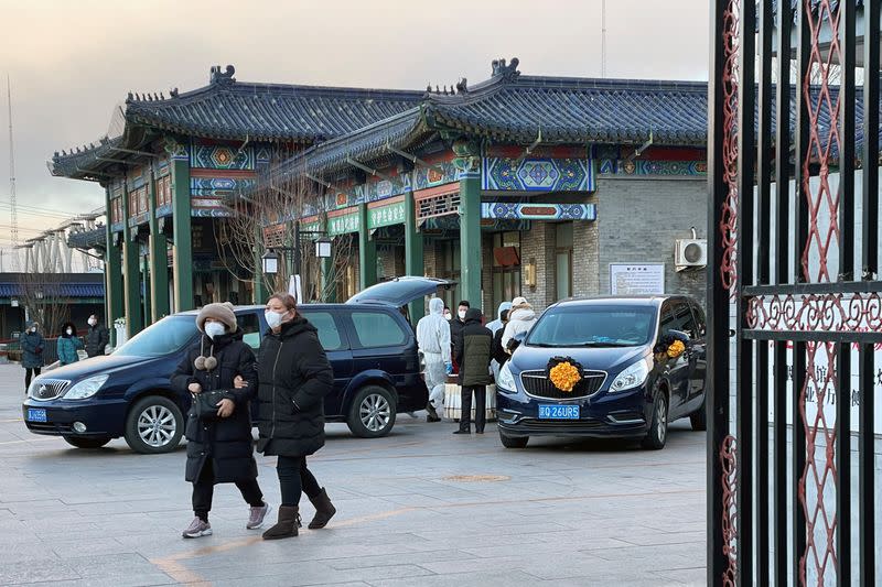 Workers at a funeral home in Beijing