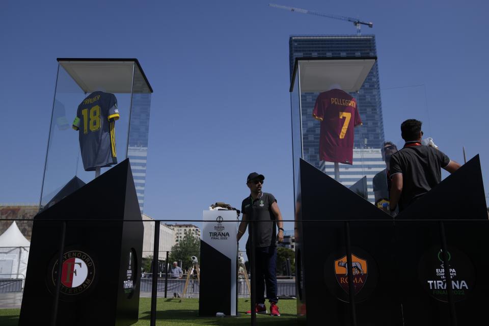 Workers prepare a stage at the fan zone ahead of the Europa Conference League final between Roma and Feyenoord in Tirana, Albania, Wednesday, May 25, 2022. (AP Photo/Thanassis Stavrakis)