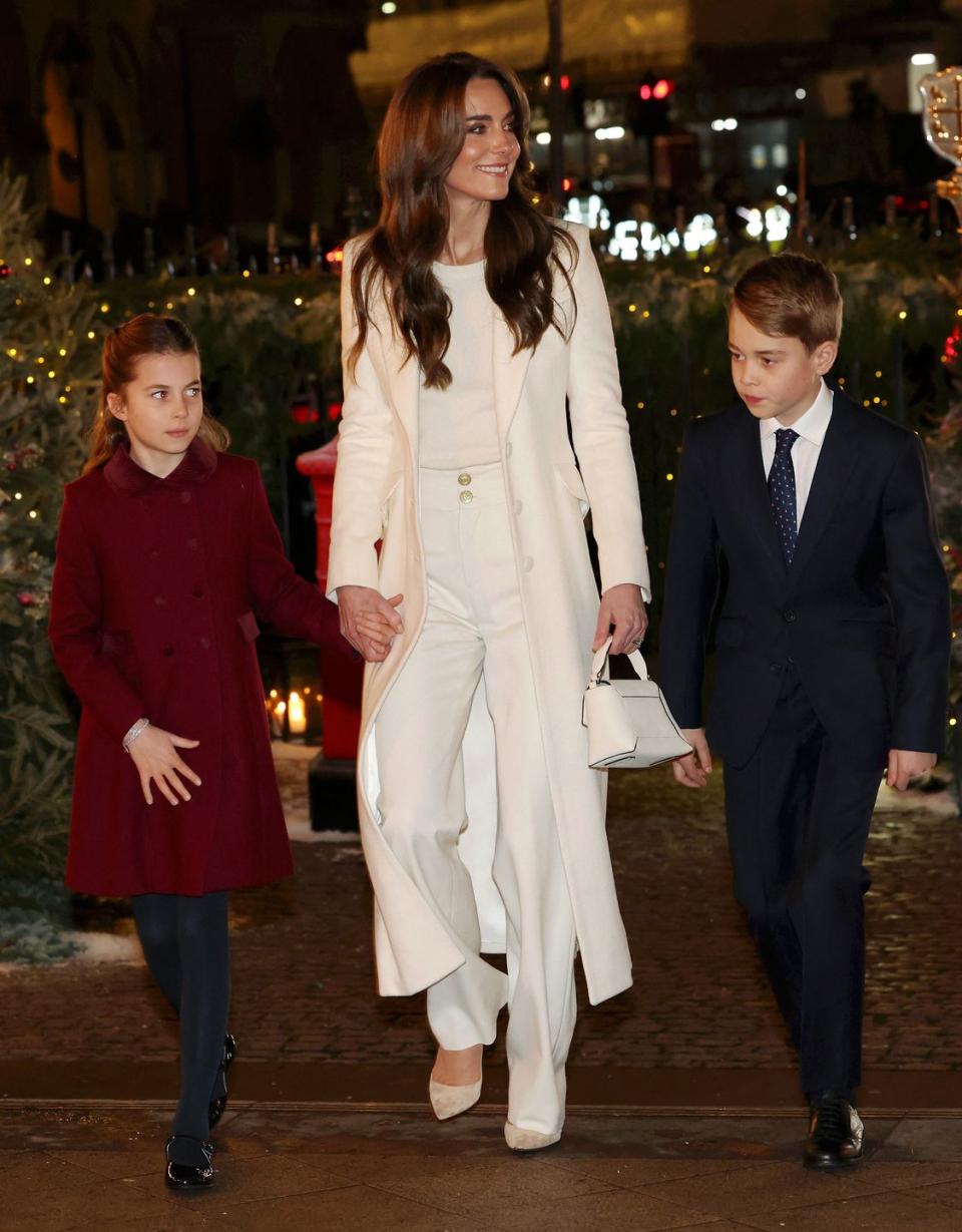 britains catherine, princess of wales c, britains princess charlotte of wales l and britains prince george of wales r arrive to attend the together at christmas carol service at westminster abbey in london on december 8, 2023 the event will be broadcast as part of royal carols together at christmas, a special programme, airing at 745pm on itv1 and itv x on christmas eve photo by chris jackson pool afp photo by chris jacksonpoolafp via getty images