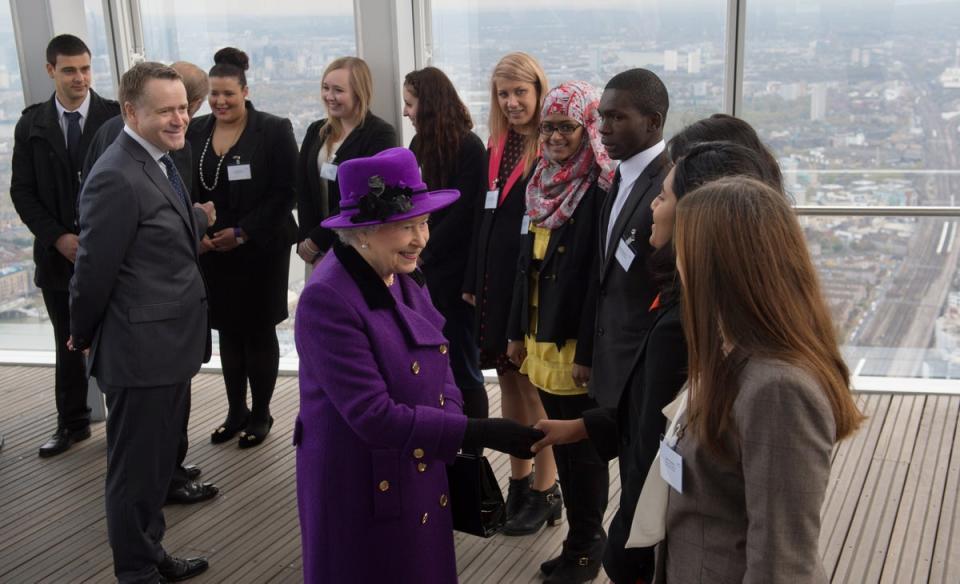 Queen Elizabeth II meets young people during an official visit to The Shard building in central London, 2013 (AFP via Getty Images)