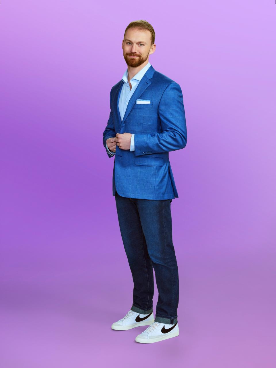 Ben, a candidate at "Love is blind" Season 6, wearing a blue jacket and jeans