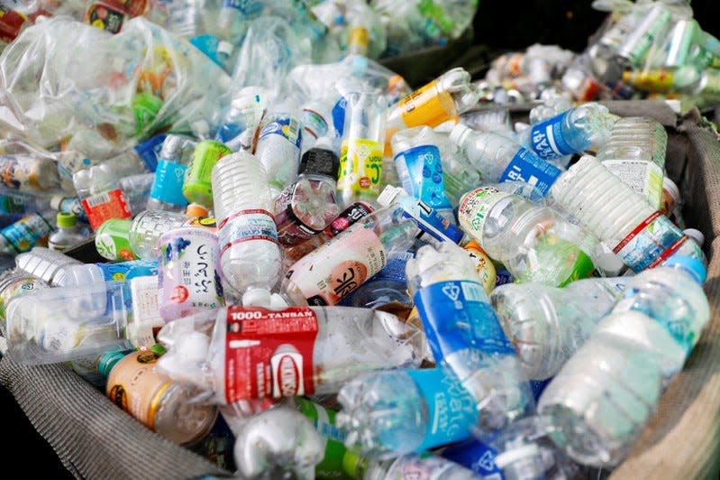 FILE PHOTO: Used plastic bottles are seen at a waste collection point in Tokyo, Japan, November 21, 2018.   REUTERS/Toru Hanai/File Photo