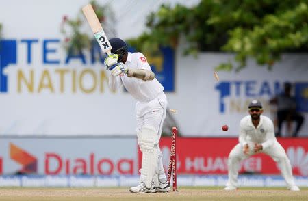 Cricket - Sri Lanka v India - First Test Match - Galle, Sri Lanka - July 28, 2017 - Sri Lanka's Nuwan Pradeep is bowled out by India's Hardik Pandya (not pictured). REUTERS/Dinuka Liyanawatte