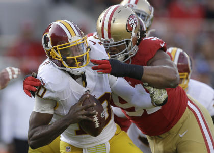 Robert Griffin III was sacked five times in Sunday's loss to the Niners. (AP)