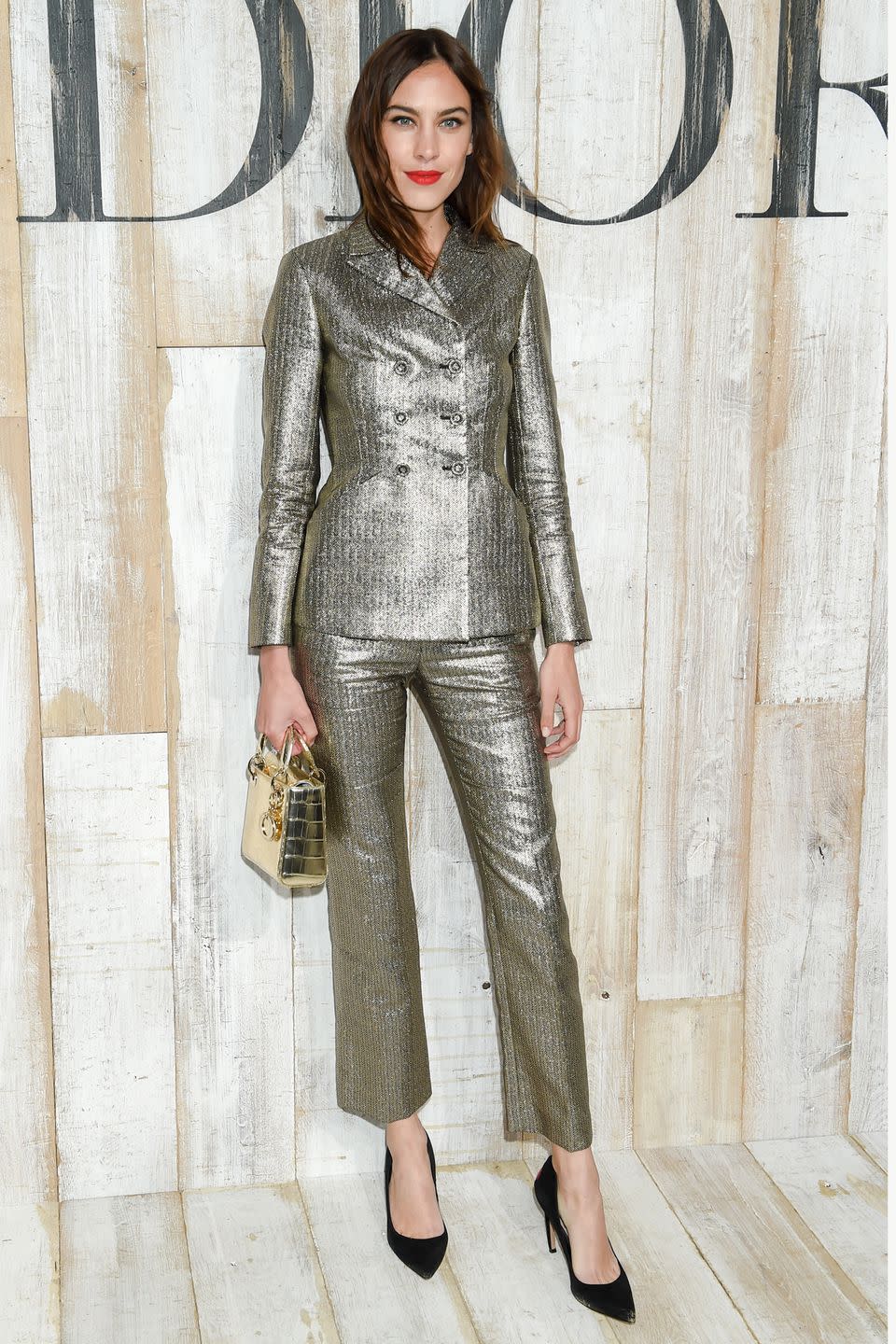 <p><strong>25 May </strong>Alexa Chung opted for a metallic Dior suit.</p>