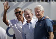 <p>(L-R) Former U.S. Presidents Barack Obama, George W. Bush and Bill Clinton attend the trophy presentation prior to Thursday foursome matches of the Presidents Cup at Liberty National Golf Club on September 28, 2017 in Jersey City, New Jersey. (Photo by Rob Carr/Getty Images) </p>