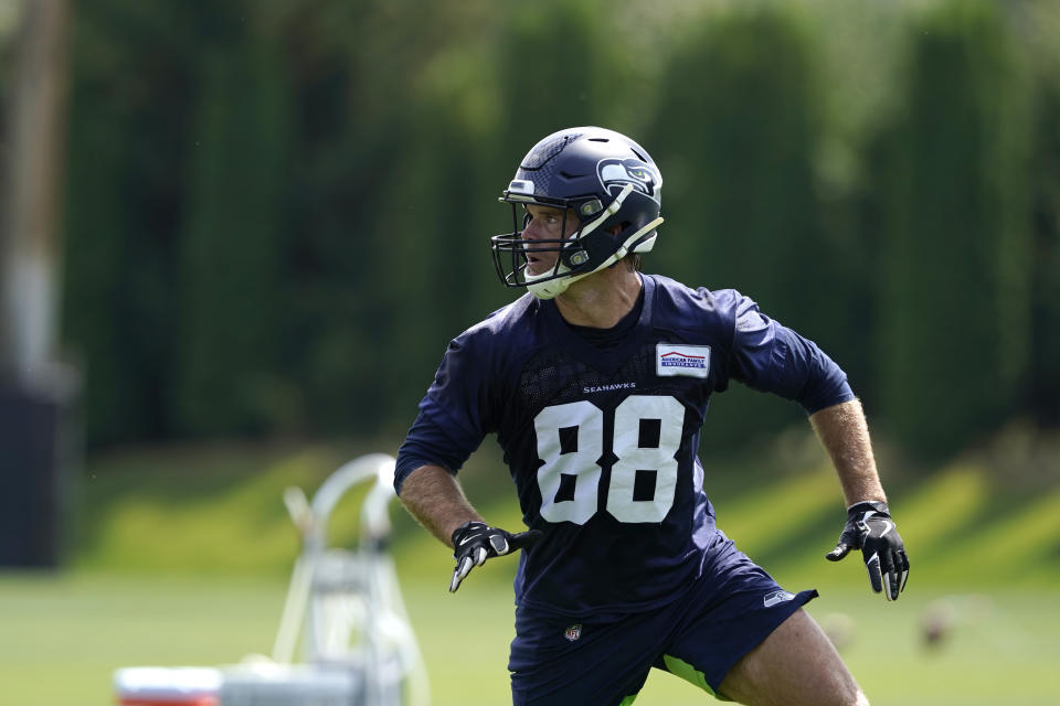 Seattle Seahawks tight end Greg Olsen runs a practice drill during NFL football training camp, Wednesday, Aug. 12, 2020, in Renton, Wash. (AP Photo/Ted S. Warren, Pool)