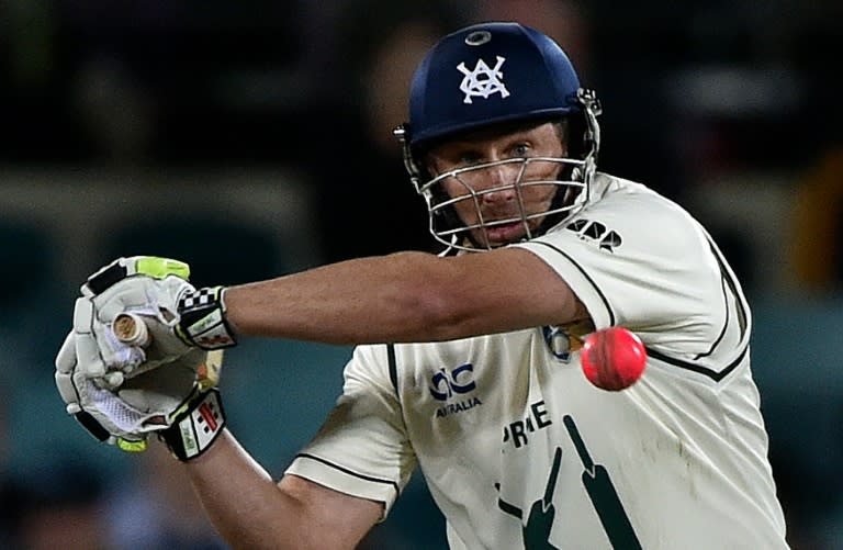 Australia's Prime Minister's XI batsman David Hussey plays a shot with the pink ball during a limited overs match against New Zealand in Canberra on October 23, 2015