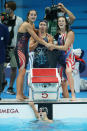 <p>TOKYO, JAPAN - JULY 29: Kathryn McLaughlin, Paige Madden, Allison Schmitt and Katie Ledecky of Team United States react after winning the silver medal in the Women's 4 x 200m Freestyle Relay Final on day six of the Tokyo 2020 Olympic Games at Tokyo Aquatics Centre on July 29, 2021 in Tokyo, Japan. (Photo by Alexander Hassenstein/Getty Images)</p> 