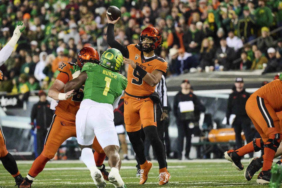 Nov 24, 2023; Eugene, Oregon, USA; Oregon State Beavers quarterback DJ Uiagalelei (5) throws a pass during the first half against the Oregon Ducks at Autzen Stadium. Mandatory Credit: Troy Wayrynen-USA TODAY Sports