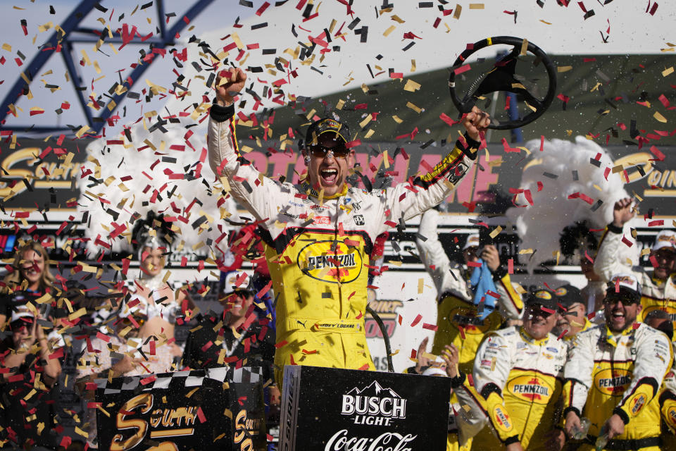 Joey Logano celebrates after winning a NASCAR Cup Series auto race Sunday, Oct. 16, 2022, in Las Vegas. (AP Photo/John Locher)