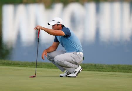 Sep 8, 2016; Carmel, IN, USA; Jason Day lines up a putt on the 18th hole during the first round of the BMW Championship at Crooked Stick GC. Mandatory Credit: Brian Spurlock-USA TODAY Sports