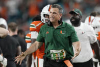 Miami head coach Mario Cristobal reacts during the first half of an NCAA college football game against Pittsburgh, Saturday, Nov. 26, 2022, in Miami Gardens, Fla. (AP Photo/Lynne Sladky)