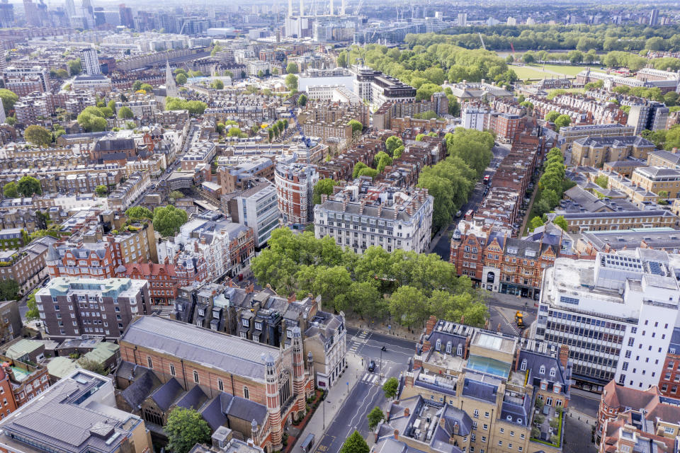 LONDON,ENGLAND - MAY 14:  (EDITORS NOTE: Full Flight Permissions) An aerial view by drone of Sloane Square showing London and the River Thames behind showing Peter Jones store and Sloane Square tube station on May 14,2020 in London,England. (Photo by Chris Gorman/Getty Images)