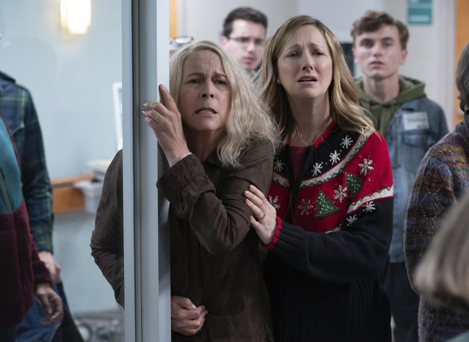 This image released by Universal Pictures shows Jamie Lee Curtis and Judy Greer in "Halloween Kills," directed by David Gordon Green. (Ryan Green/Universal Pictures via AP)