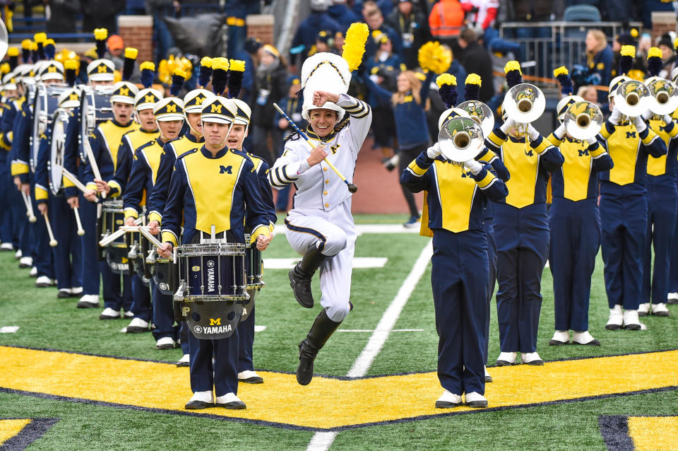 The Michigan Wolverines marching band, led by Drum Major Kelly Bertoni, plays before a game against the Ohio State Buckeyes at Michigan Stadium on Nov. 30, 2019 in Ann Arbor, Mich. (Photo by Aaron J. Thornton/Getty Images)