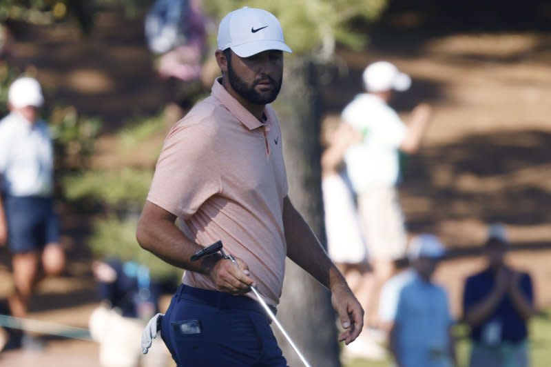 Scottie Scheffler walks off the green after sinking a birdie putt on No. 10 during the final round of the 2024 Masters Tournament on Sunday at Augusta National Golf Club in Augusta, Ga. Photo by Tannen Maury/UPI