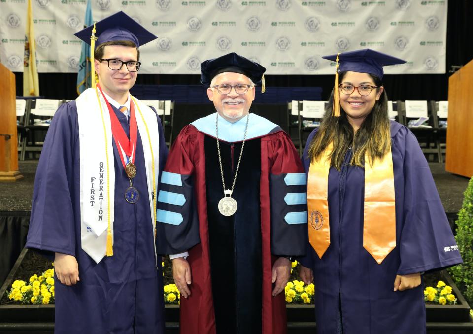 Thomas Emens of Jamesburg, Middlesex College President Mark McCormick and Nathalia Allenza of Plainsboro at Thursday's graduation ceremony. Emens and Allenza will both be attending Princeton University in the fall to earn their bachelor degree. Allenza will study public policy and Emens will study politics.