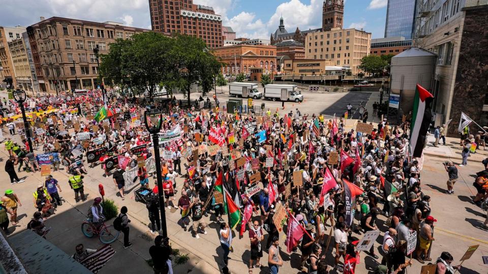 PHOTO: Protestors march near the Fiserv Forum during the first day of the 2024 Republican National Convention, July 15, 2024, in Milwaukee.  (Alex Brandon/AP)
