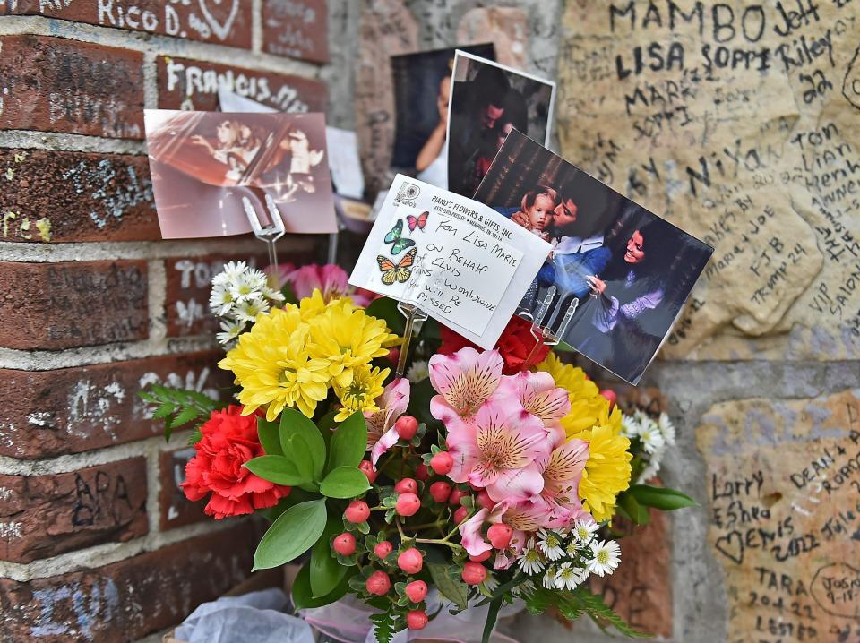 Flowers left by fans outside Graceland to pay respects to Lisa Marie Presley on January 13, 2023 in Memphis, Tennessee.