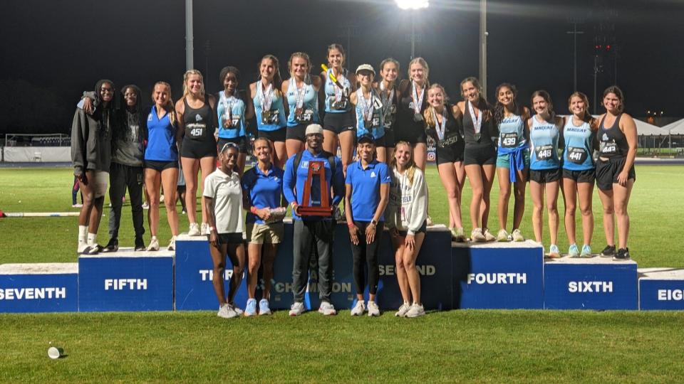 Maclay girls track and field poses with FHSAA state championship