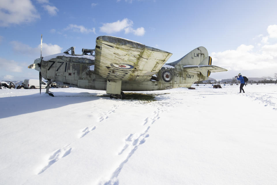 An abandoned Royal Navy Fairey Gannet XG882 aircraft near Perth is surrounded by snow as the cold snap continues to grip much of the nation. Picture date: Friday February 12, 2021.