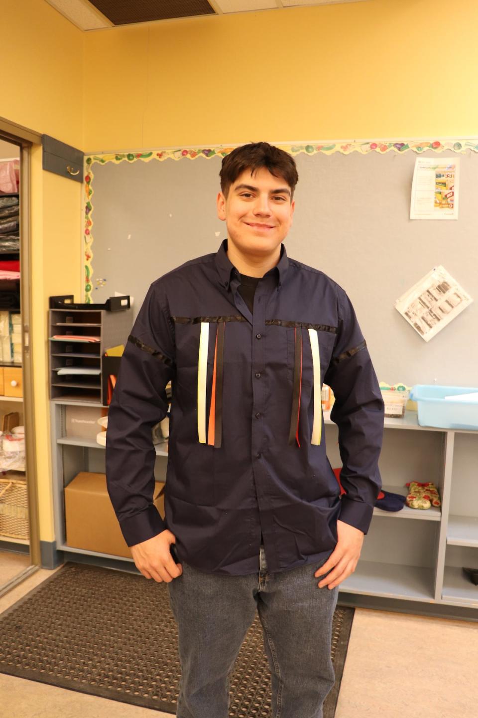 Reese Jackson shows off the ribbon shirt he made as part of the Northern Cultural Expression Society’s Yukon First Nation Grad Regalia program.