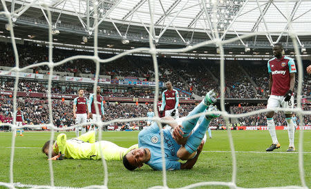 Soccer Football - Premier League - West Ham United v Manchester City - London Stadium, London, Britain - April 29, 2018 Manchester City's Gabriel Jesus tumbles after scoring their third goal Action Images via Reuters/John Sibley