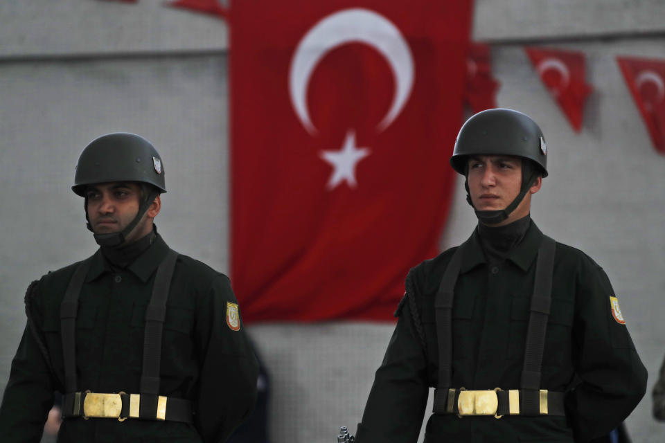 Turkish soldiers stand in attention during a ceremony for soldier Sefa Findik, killed in action with Kurdish fighters in Syria earlier Sunday, during a ceremony at the airport in Sanliurfa southeastern Turkey, Sunday, Oct. 20, 2019.It brings Turkey's military death toll up to seven soldiers in its wide-ranging offensive against Syrian Kurdish forces. (AP Photo/Lefteris Pitarakis)