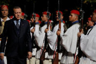 Turkish President Tayyip Erdogan inspects a guard of honour during a welcome ceremony in Athens, Greece December 7, 2017. REUTERS/Alkis Konstantinidis